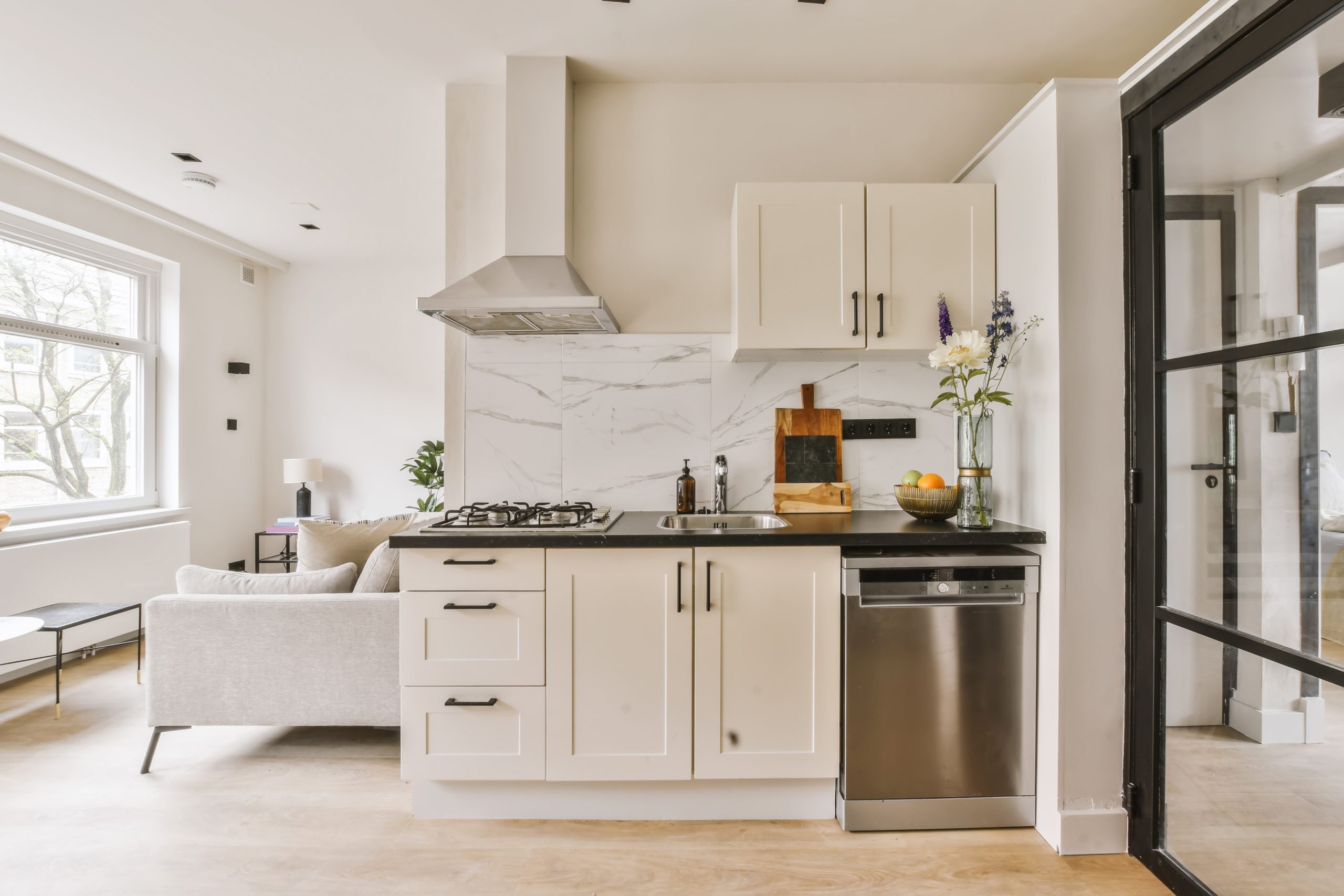 a modern kitchen with marble counter tops - Castle Property Services - Builders and Property Specialists in Newcastle-under-Lyme Staffordshire
